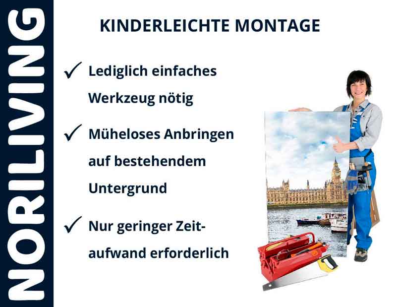 NORILIVING - Kinderleichte Montage von Wanddekorationen Frau in Arbeitskleidung zeigt die einfache Montage von NORILIVING Dekoration: Werkzeugkasten und Bild von London im Hintergrund.