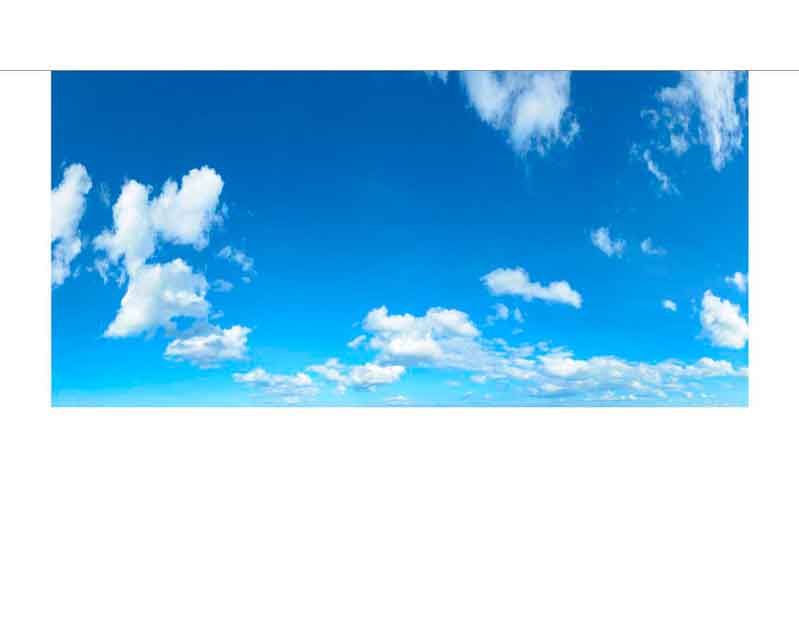 Fotografie eines klaren blauen Himmels mit vereinzelten weißen Wolken