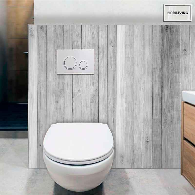 Ein modernes Wand-WC mit eleganter Holzverkleidung und zwei Tasten an der Spülung in einem stilvollen Badezimmer.