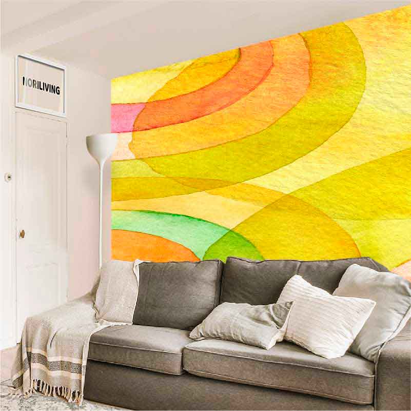 Modernes Wohnzimmer mit grauem Sofa und farbenfroher Wandtapete