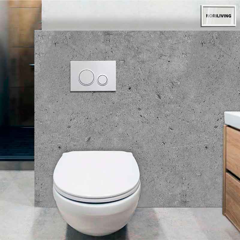 Wandhängendes WC vor grauer Fliesenwand im Badezimmer