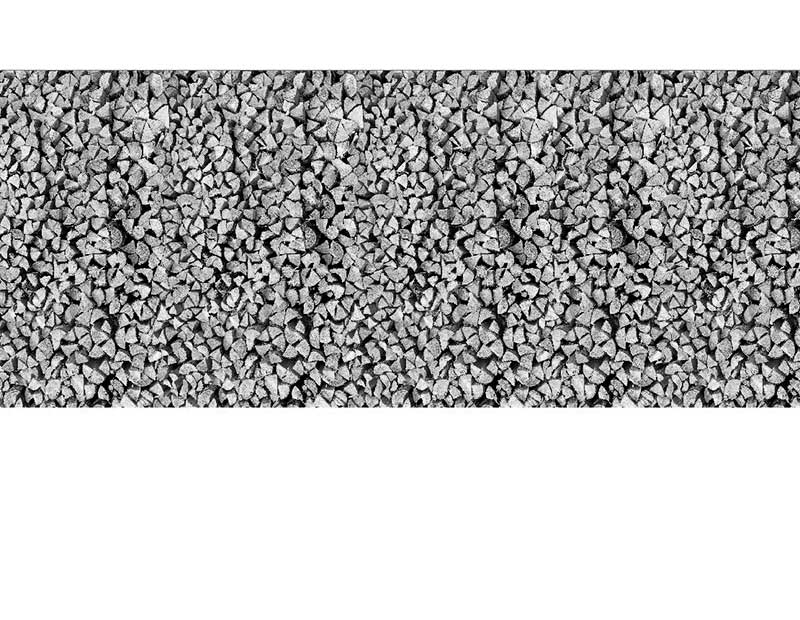 Hintergrundmuster aus eng aneinandergereihten, kleinen grauen Steinen