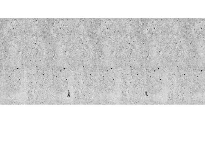 Hintergrundbild einer grauen Betonwand mit kleinen schwarzen Flecken und unregelmäßiger Textur