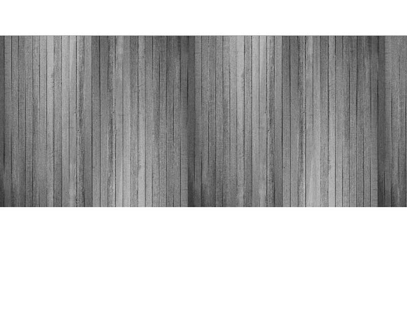 Detailansicht einer grauen Wand aus vertikalen Holzlatten