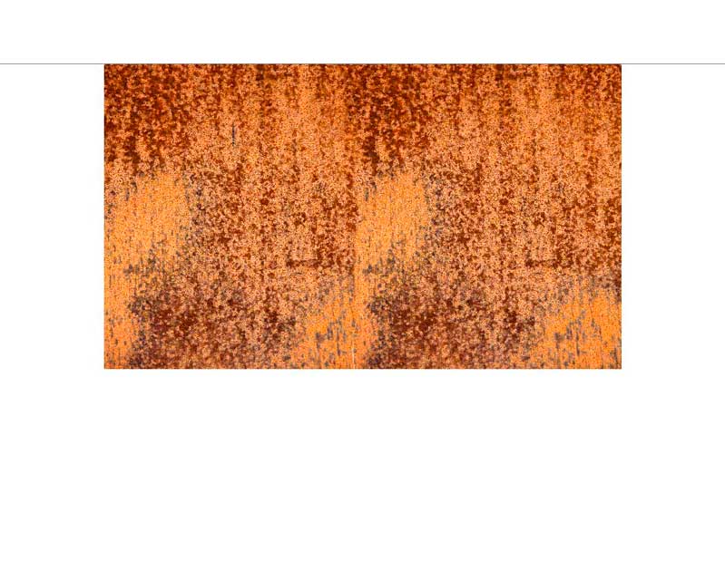 Nahaufnahme eines Teppichs mit vintage inspiriertem Muster in Orange- und Brauntönen